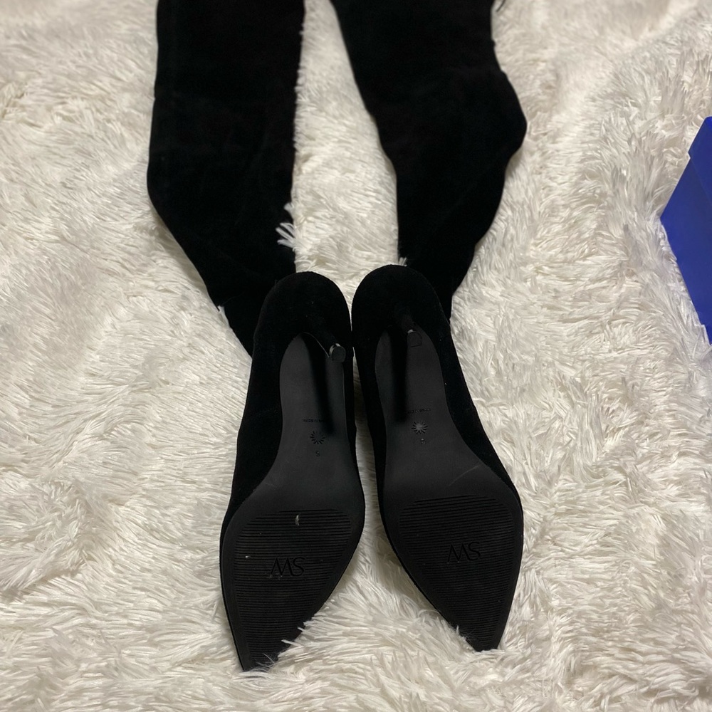 Never worn, suede thigh high boots. 4 inch heel